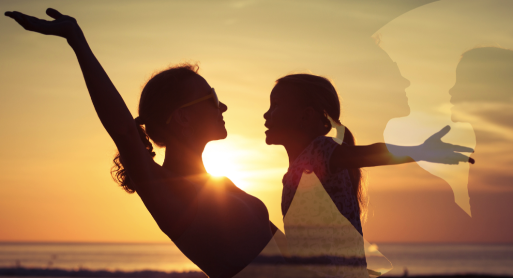 mamá e hija en la playa